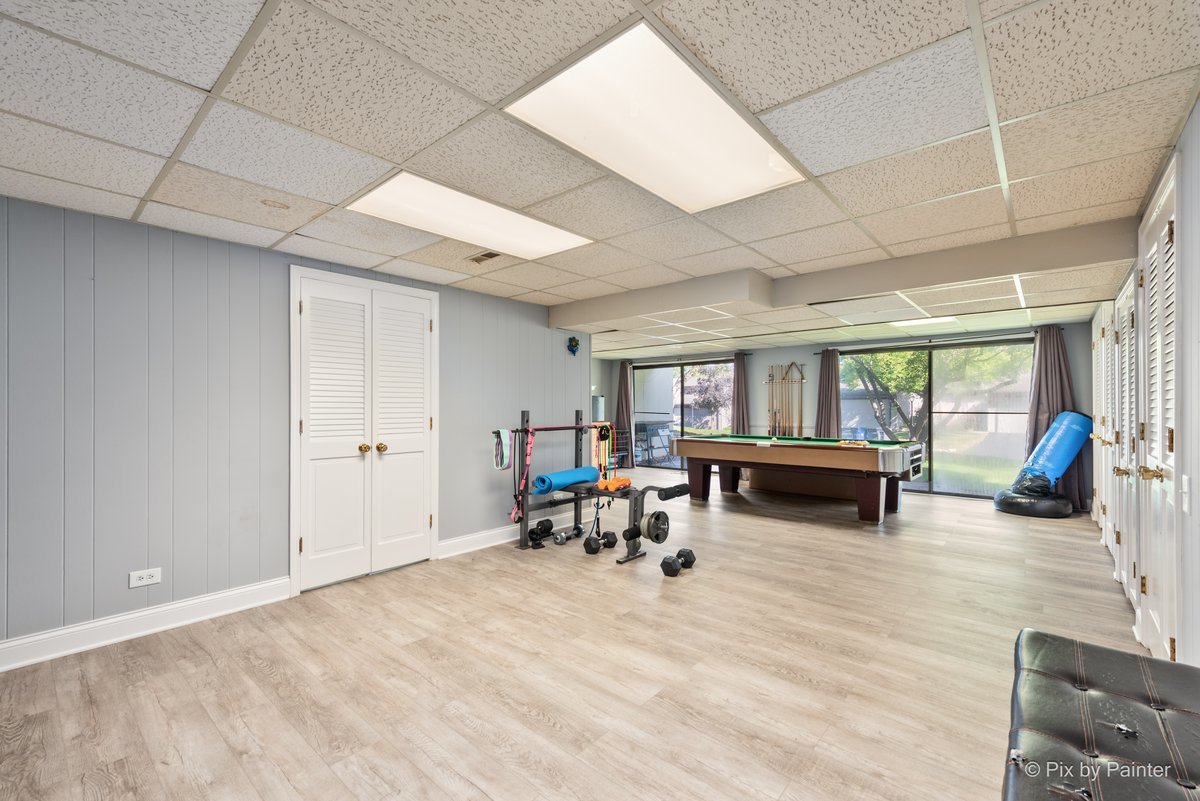 1104 Florimond Drive, Unit 1104 Elgin, IL 60123 - Photo 17 of 28 a living room with furniture and a table