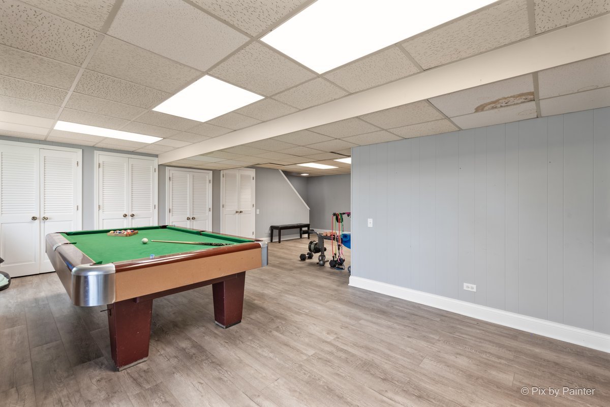 1104 Florimond Drive, Unit 1104 Elgin, IL 60123 - Photo 18 of 28 a room with table and chairs