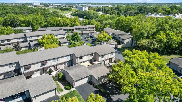 an aerial view of a house with outdoor space