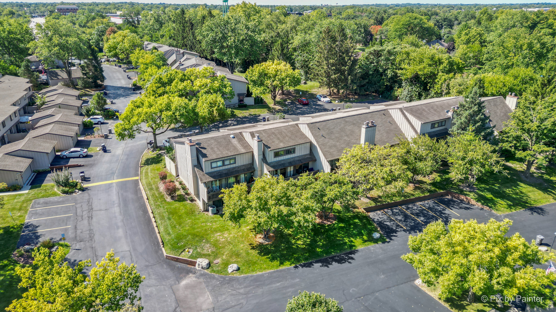 1104 Florimond Drive, Unit 1104 Elgin, IL 60123 - Photo 25 of 28 front view of a house with a yard