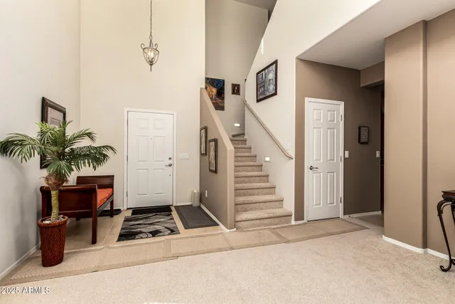 a view of entryway and workspace