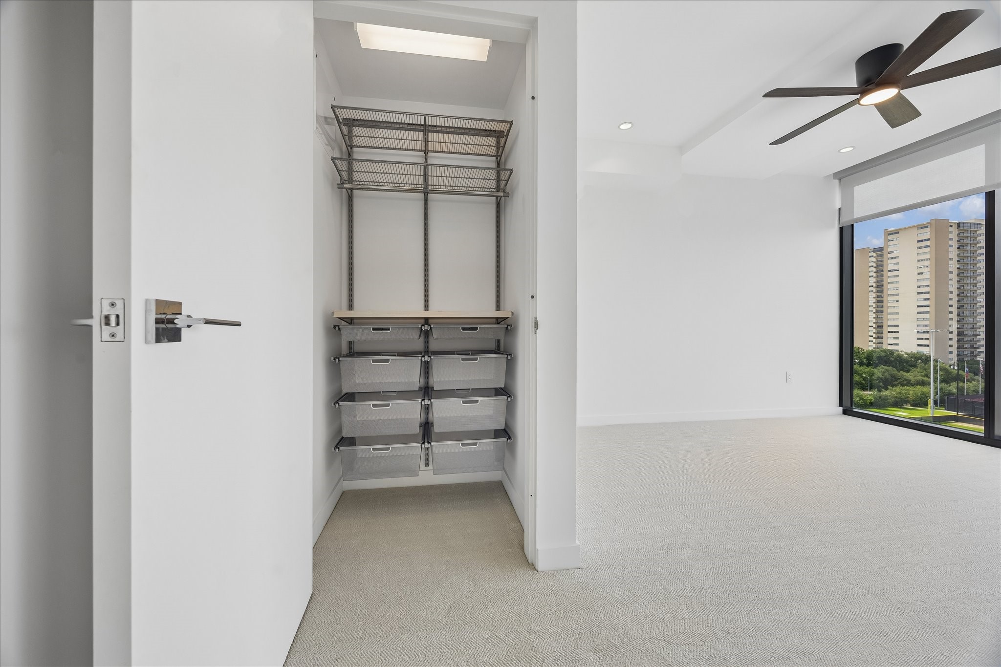3433 Westheimer Road, Unit 702 Houston, TX 77027 - Photo 27 of 48 Customizable Elfa organization systems tailored to your lifestyle and storage needs.