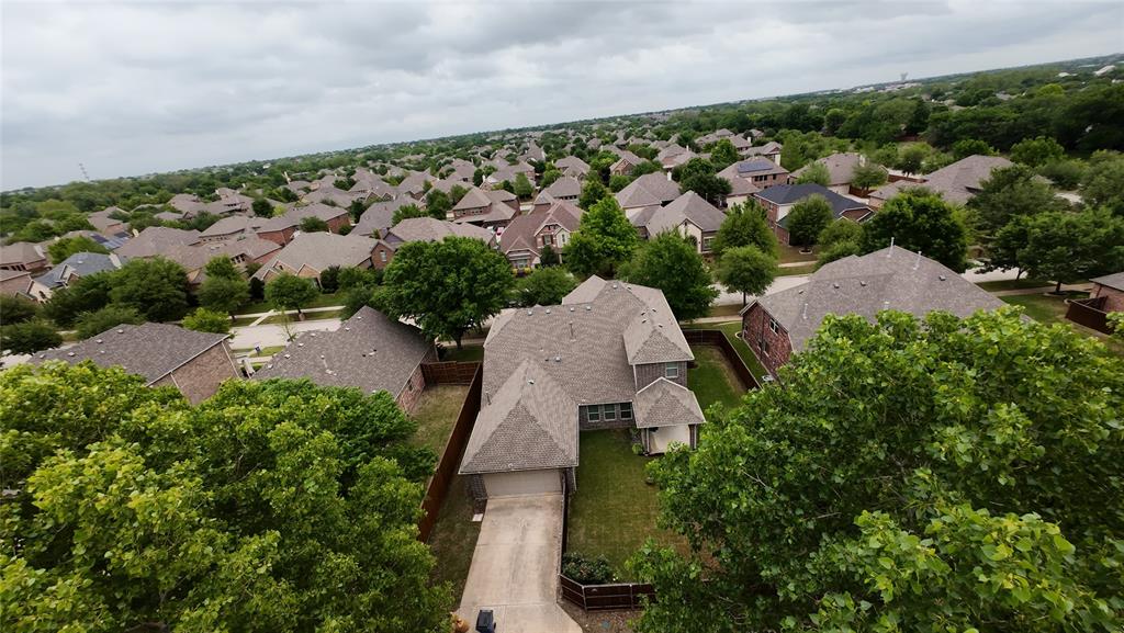 12809 Spring Hill Drive Frisco, TX 75035 - Photo 4 of 37 an aerial view of multiple house