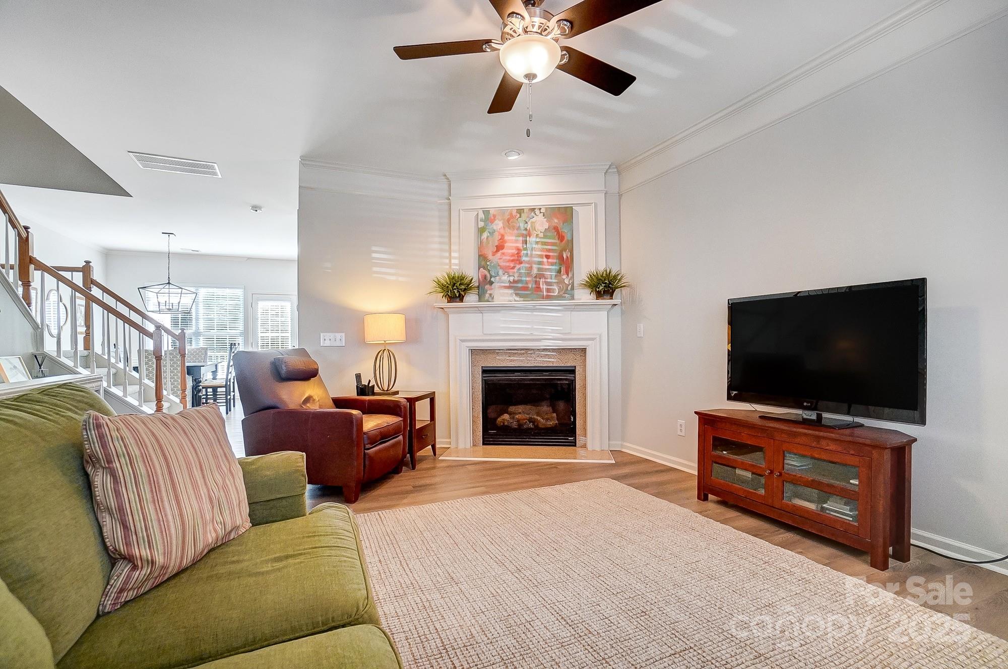 582 6th Baxter Crossing Fort Mill, SC 29708 - Photo 13 of 48 a living room with furniture and a flat screen tv