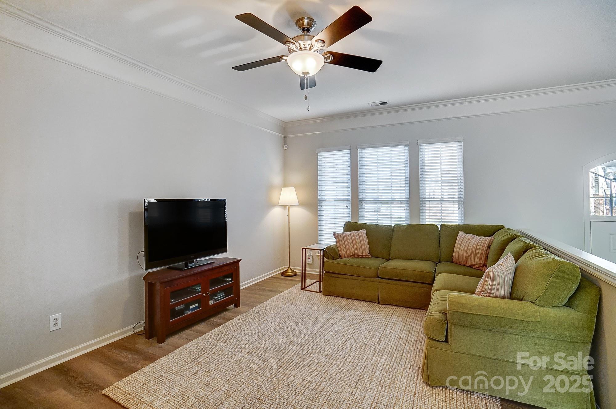 582 6th Baxter Crossing Fort Mill, SC 29708 - Photo 14 of 48 a living room with furniture and a flat screen tv