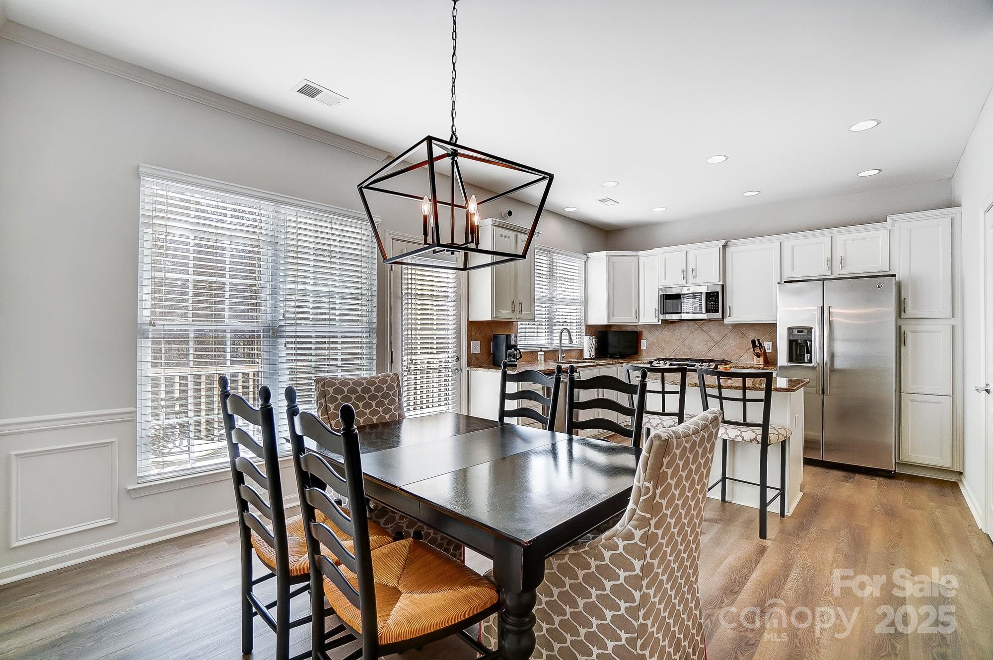 582 6th Baxter Crossing Fort Mill, SC 29708 - Photo 26 of 48 a view of a dining room with furniture