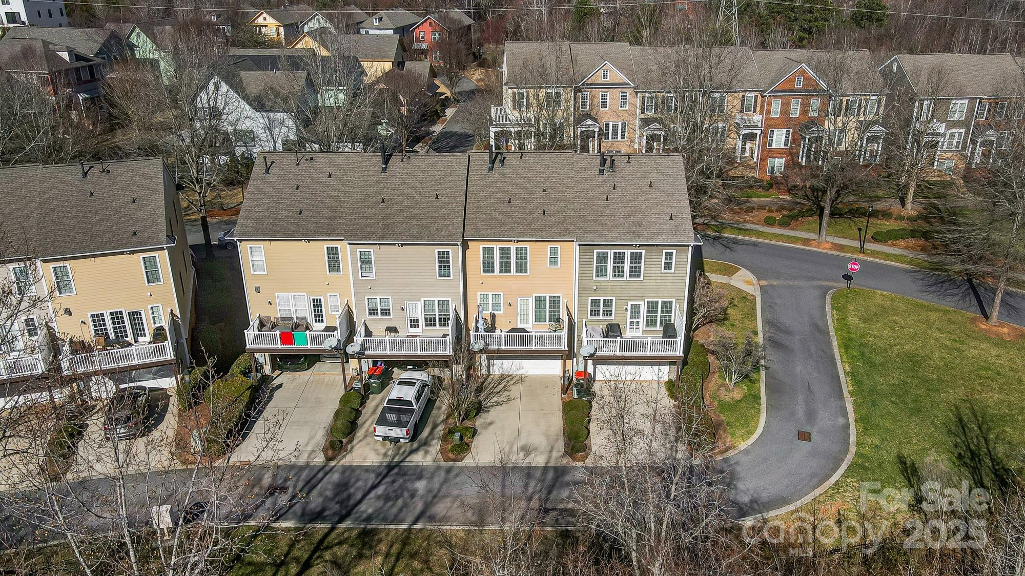 582 6th Baxter Crossing Fort Mill, SC 29708 - Photo 4 of 48 an aerial view of residential houses with outdoor space and parking