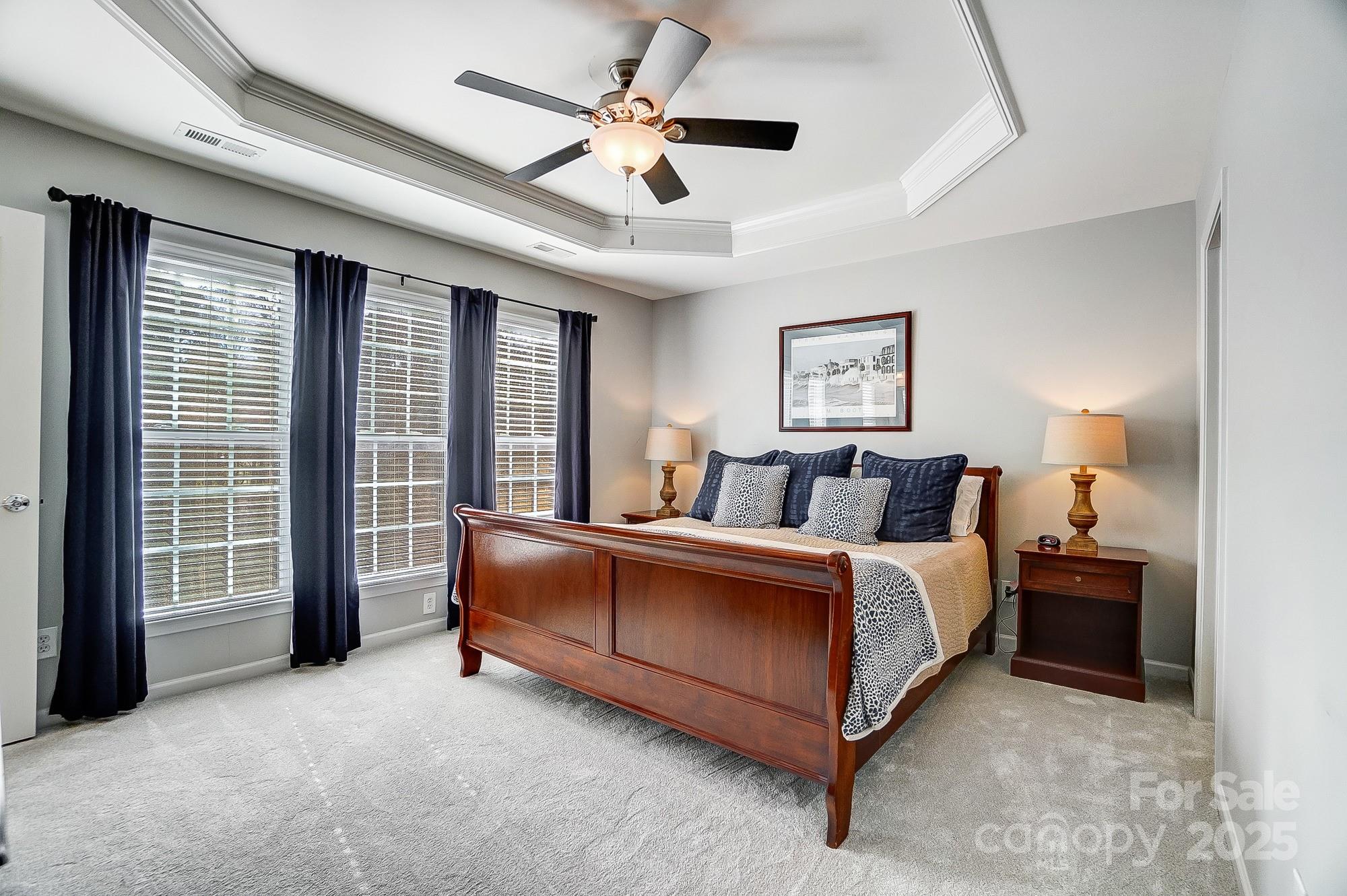 582 6th Baxter Crossing Fort Mill, SC 29708 - Photo 41 of 48 a bed room with bed and a large window