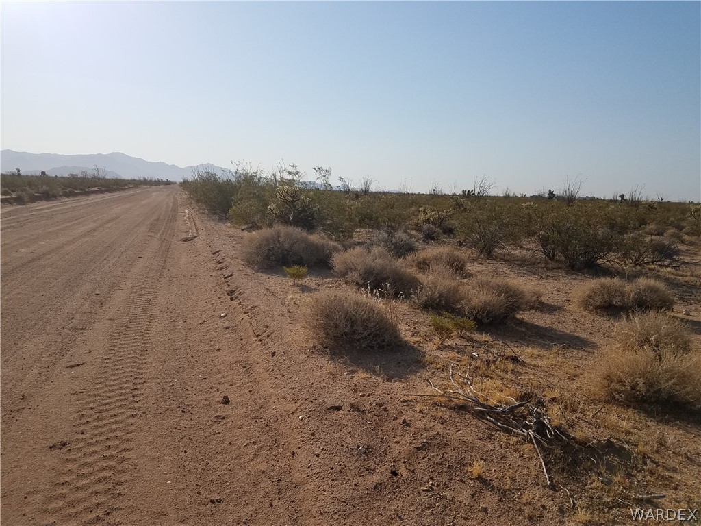3998 South Butch Cassidy Road Yucca, AZ 86438 - Photo 4 of 21 a view of an ocean beach and mountain
