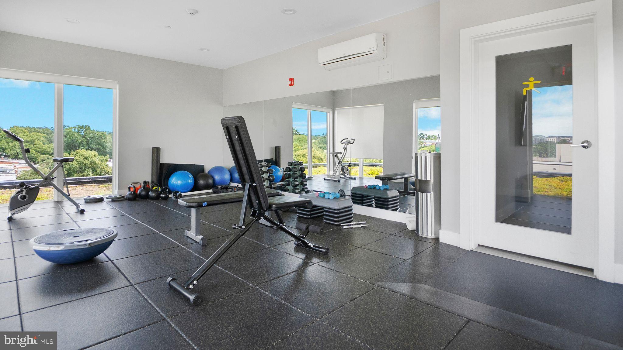 1111 Orren Street Northeast, Unit 407 Washington, DC 20002 - Photo 11 of 16 a living room filled with furniture