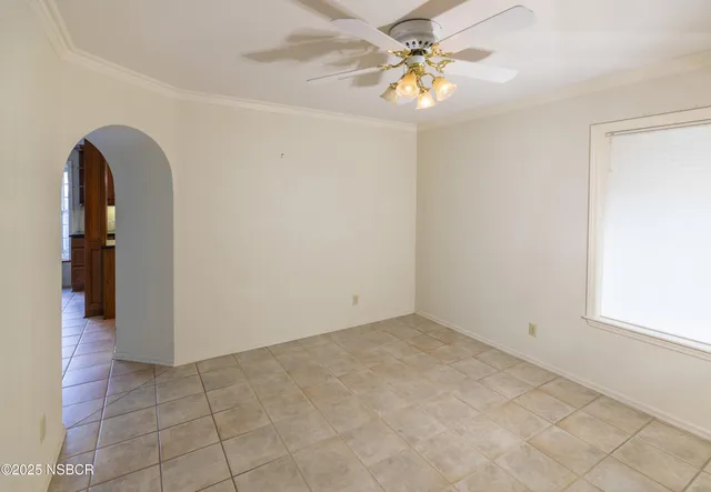 a view of empty room with a door