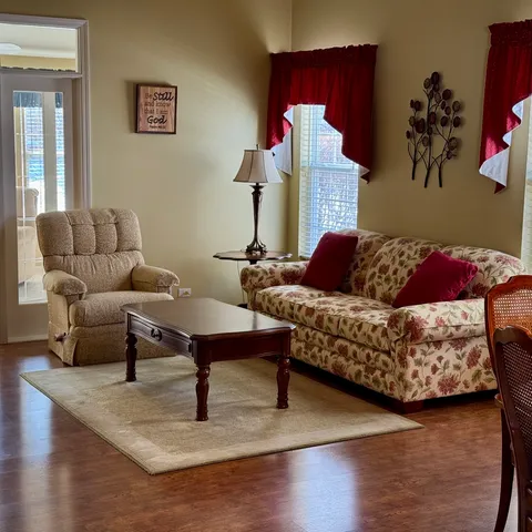 a living room with furniture and a couch
