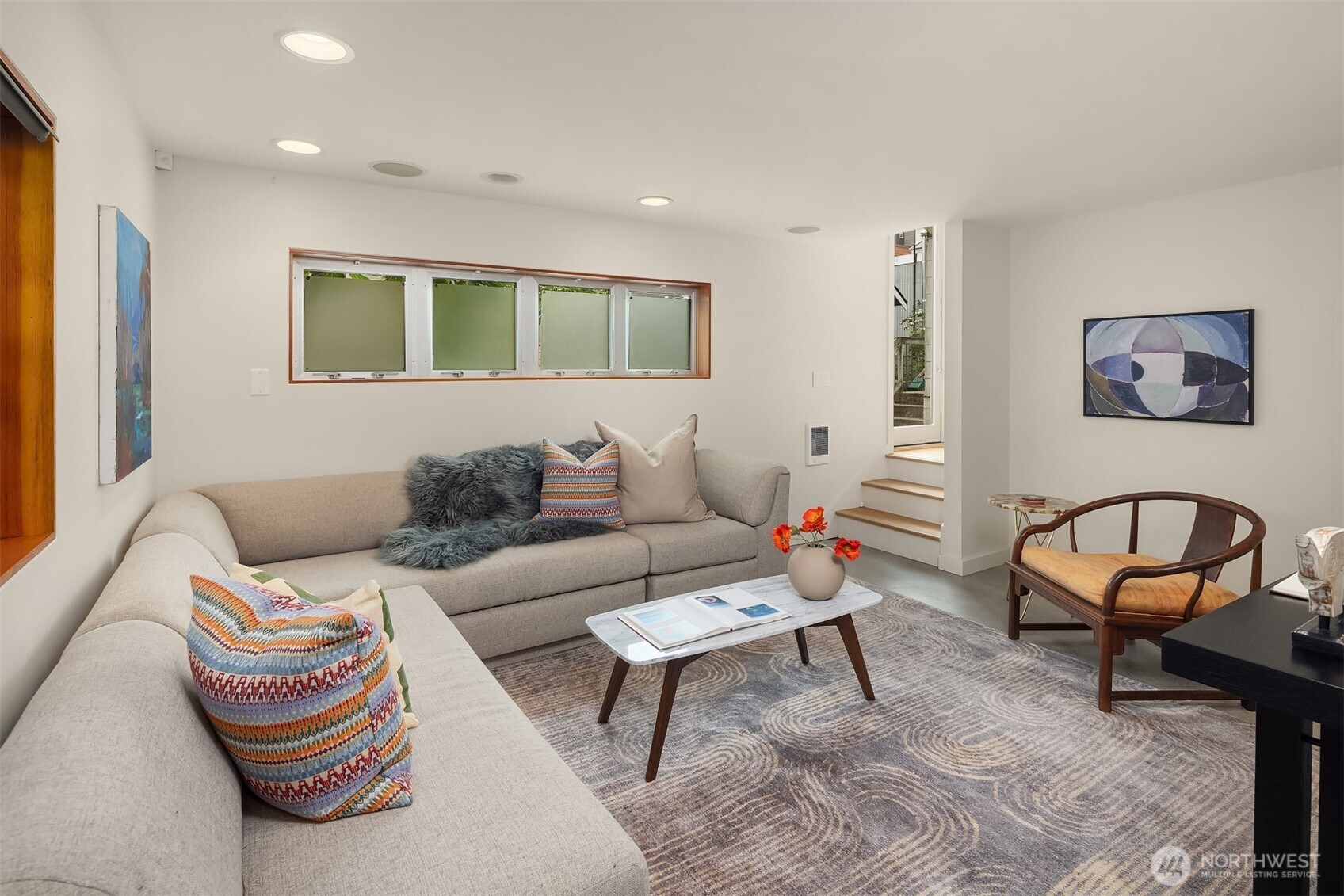 112 18th Avenue Seattle, WA 98122 - Photo 14 of 30 a living room with furniture and a rug
