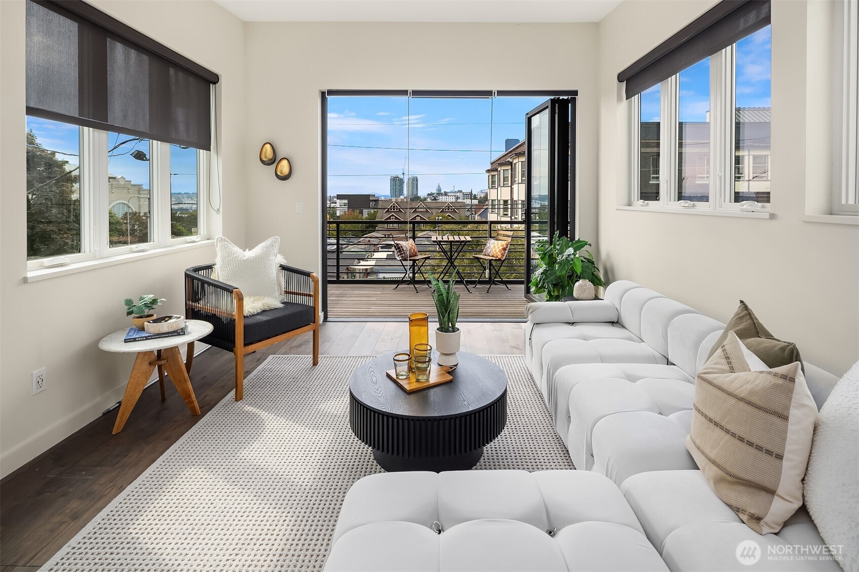 112 18th Avenue Seattle, WA 98122 - Photo 17 of 30 a living room with furniture and a large window