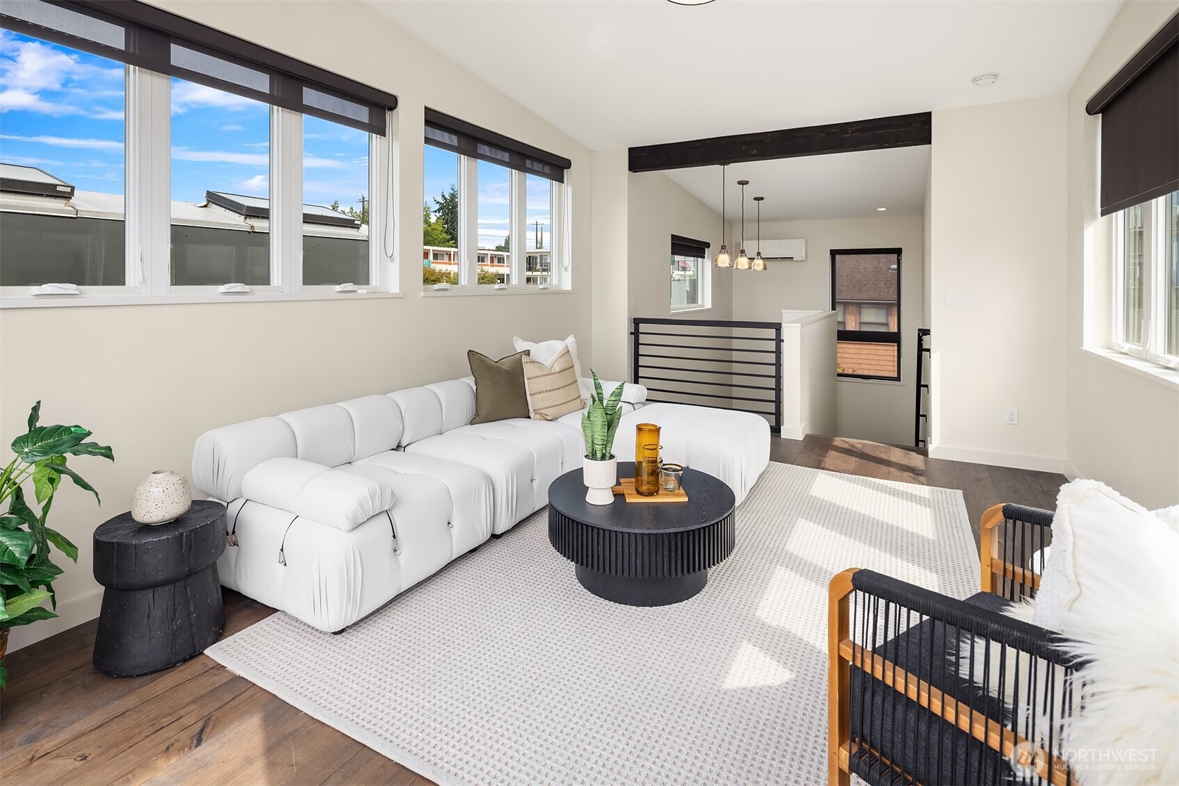 112 18th Avenue Seattle, WA 98122 - Photo 19 of 30 a living room with furniture and a potted plant