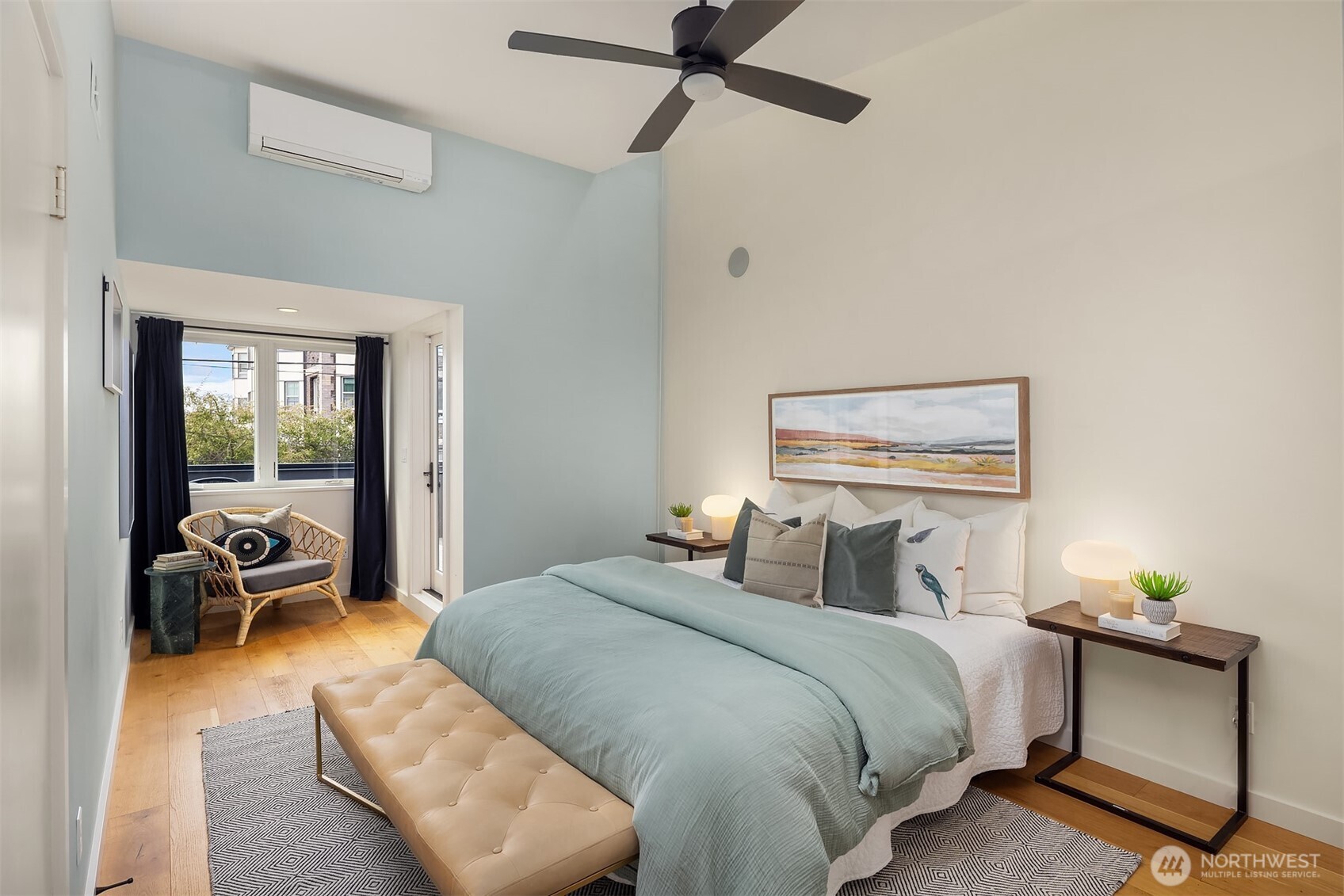 112 18th Avenue Seattle, WA 98122 - Photo 20 of 30 a bedroom with a bed and a couch