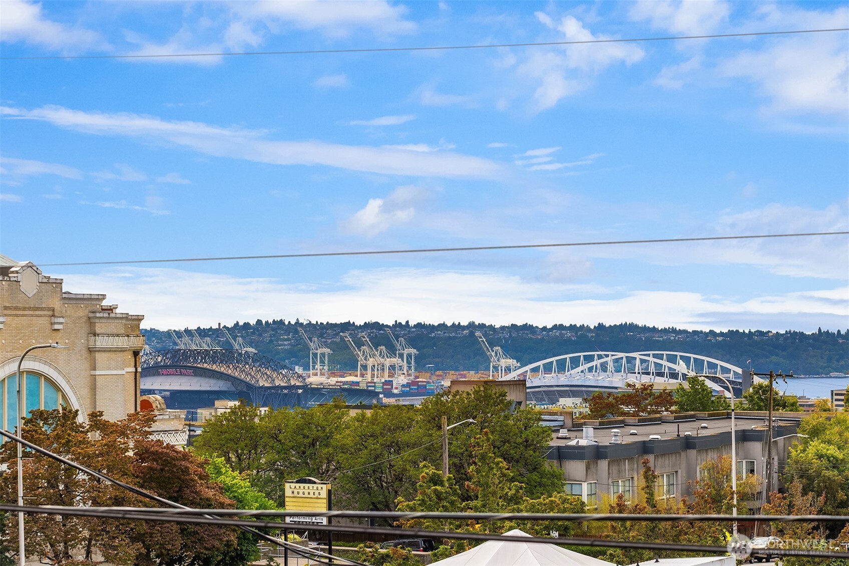 112 18th Avenue Seattle, WA 98122 - Photo 26 of 30 a view of a city with lawn chairs