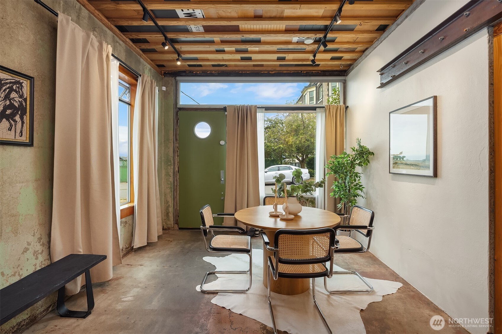 112 18th Avenue Seattle, WA 98122 - Photo 3 of 30 a dining room with furniture and window