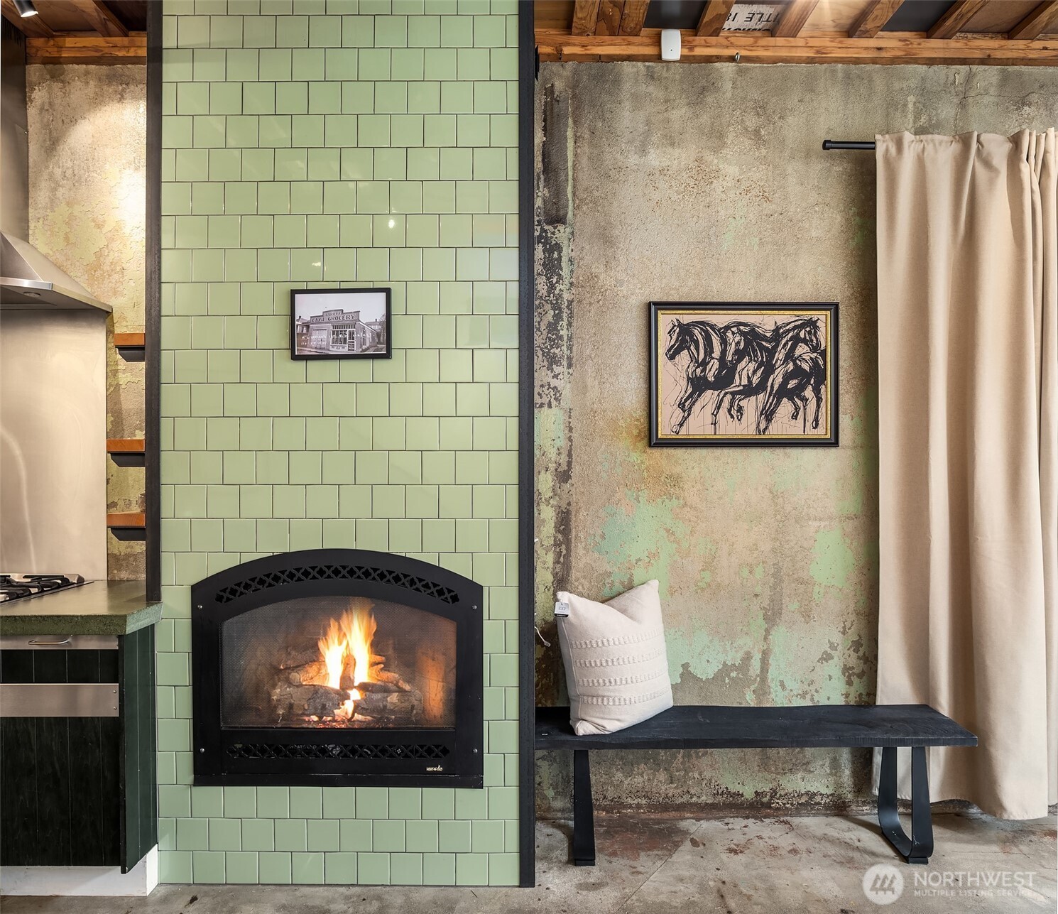 112 18th Avenue Seattle, WA 98122 - Photo 5 of 30 a view of a fireplace with furniture and a fireplace