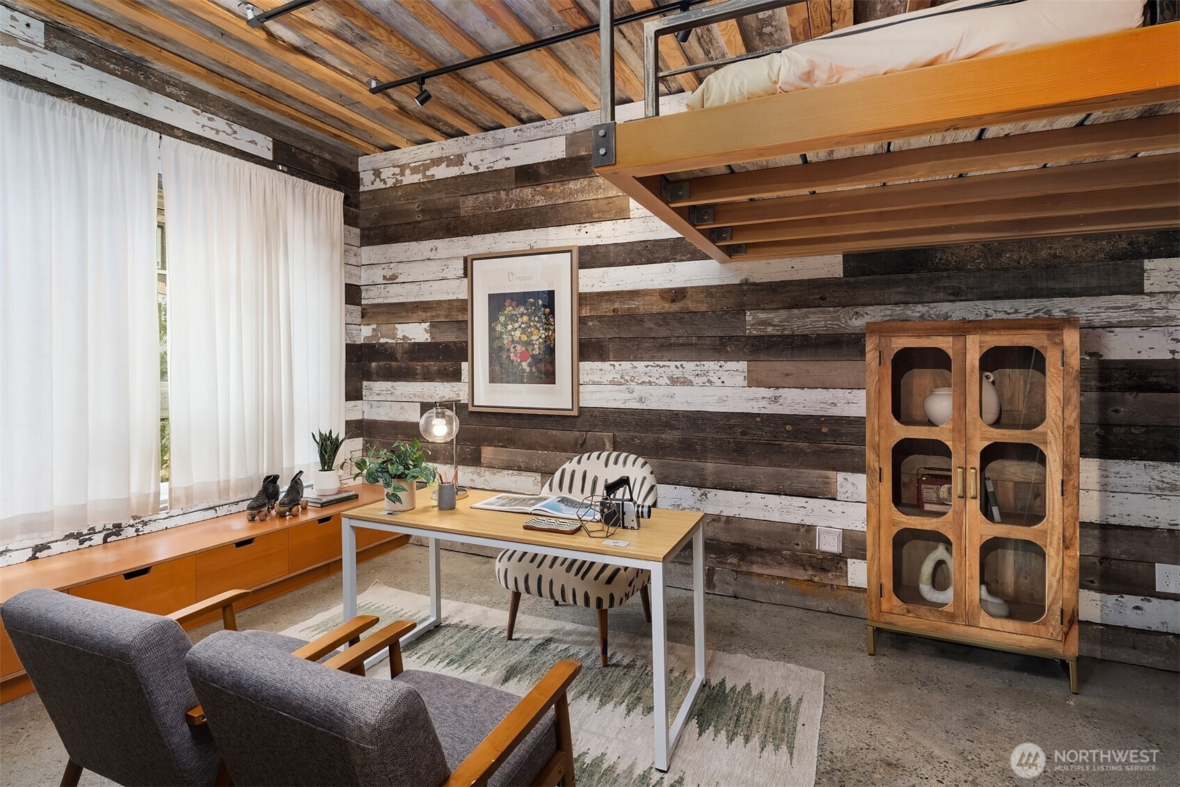 112 18th Avenue Seattle, WA 98122 - Photo 9 of 30 a blue table and chairs in front of a room