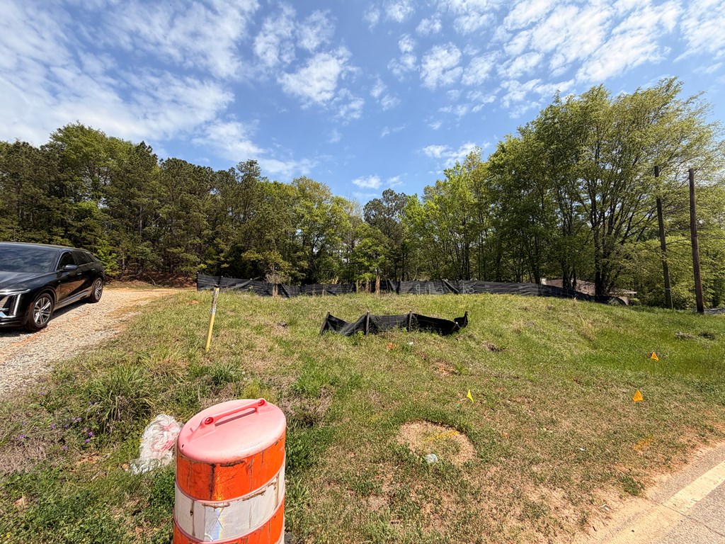 4701 Old Cusseta Road Columbus, GA 31903 - Photo 5 of 10 a backyard of a house with table and chairs