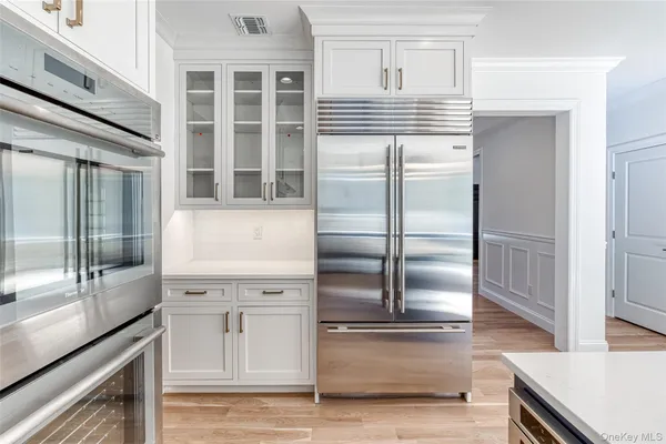 a kitchen with stainless steel appliances cabinets and a counter top
