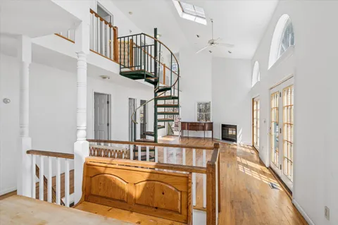 a view of a hallway with windows