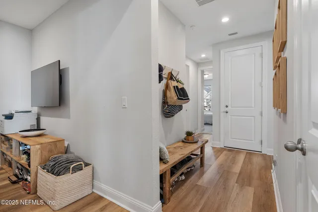 a room with furniture and a flat screen tv