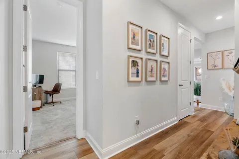 a bedroom with a bed and a chair