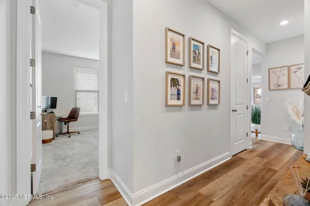 a bedroom with a bed and a chair