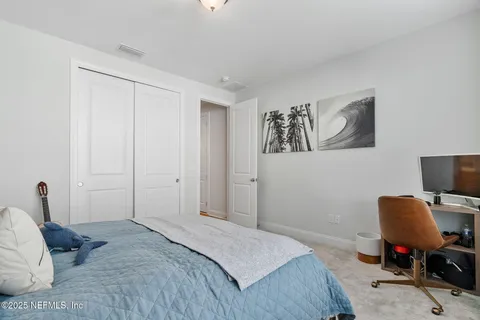 a en suite bathroom with a sink a mirror and a shower