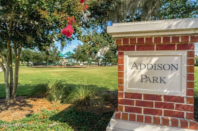 an aerial view of a house with outdoor space