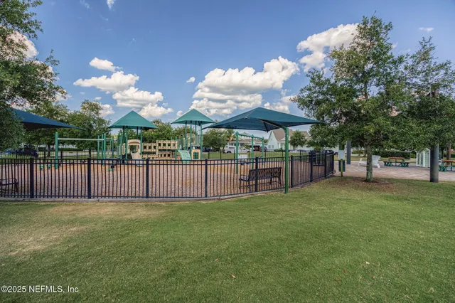 a view of a chairs and tables in patio