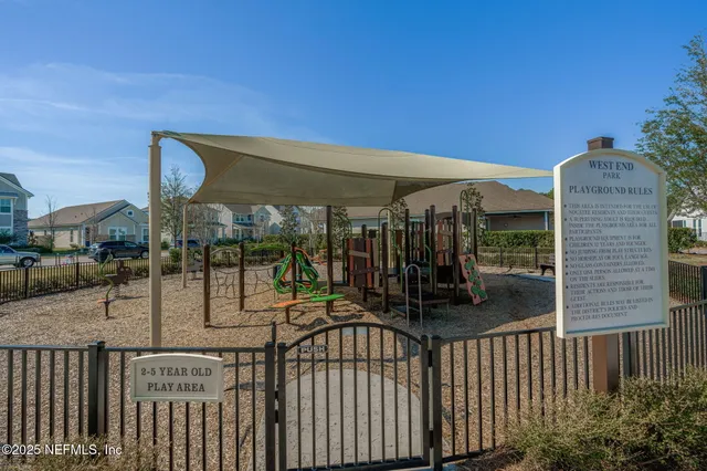 a view of a bathtub and a yard