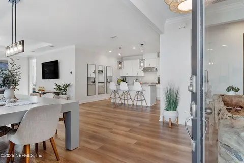 a view of a kitchen and dining room
