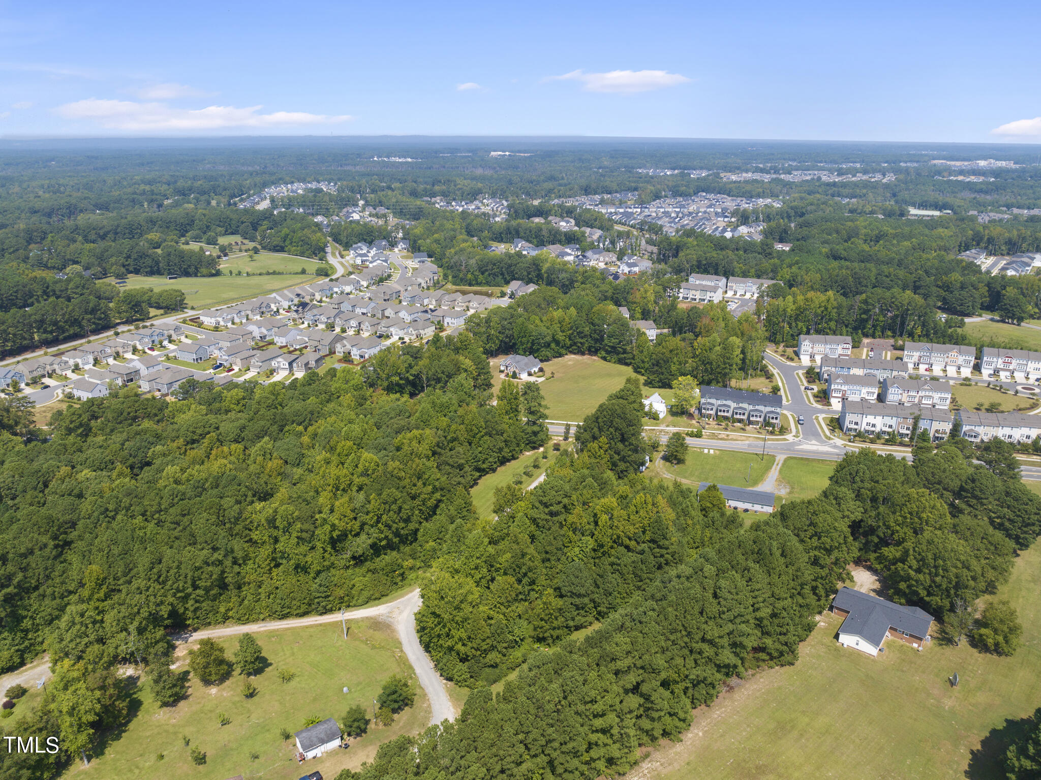 8129 Humie Olive Road Apex, NC 27502 - Photo 11 of 25 an aerial view of multiple house