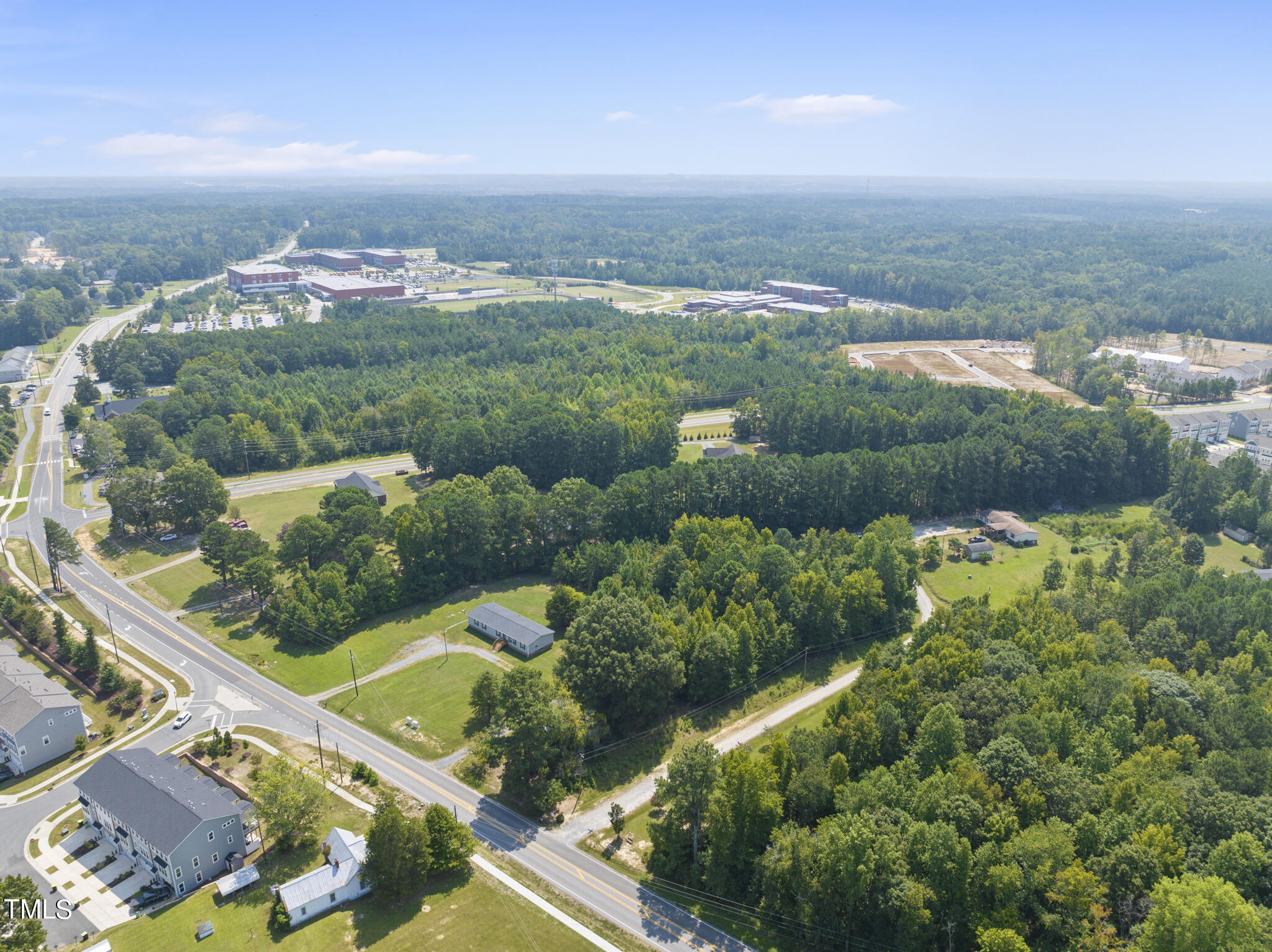 8129 Humie Olive Road Apex, NC 27502 - Photo 7 of 25 an aerial view of a city