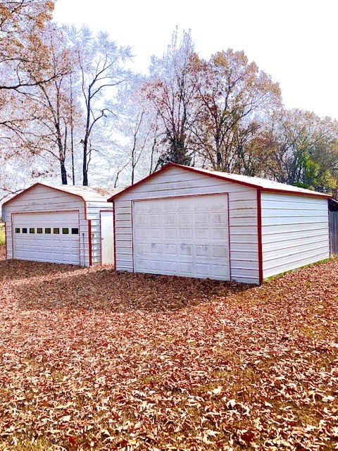 53 Old Quick Road Fayetteville, TN 37334 - Photo 4 of 18 a view of a house with a large tree and a yard