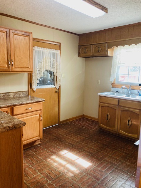 53 Old Quick Road Fayetteville, TN 37334 - Photo 9 of 18 a kitchen with stainless steel appliances granite countertop a sink stove and cabinets