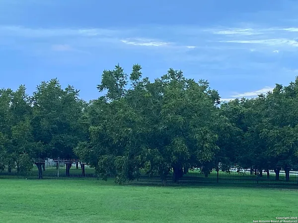 a kitchen with a sink a toilet and a window