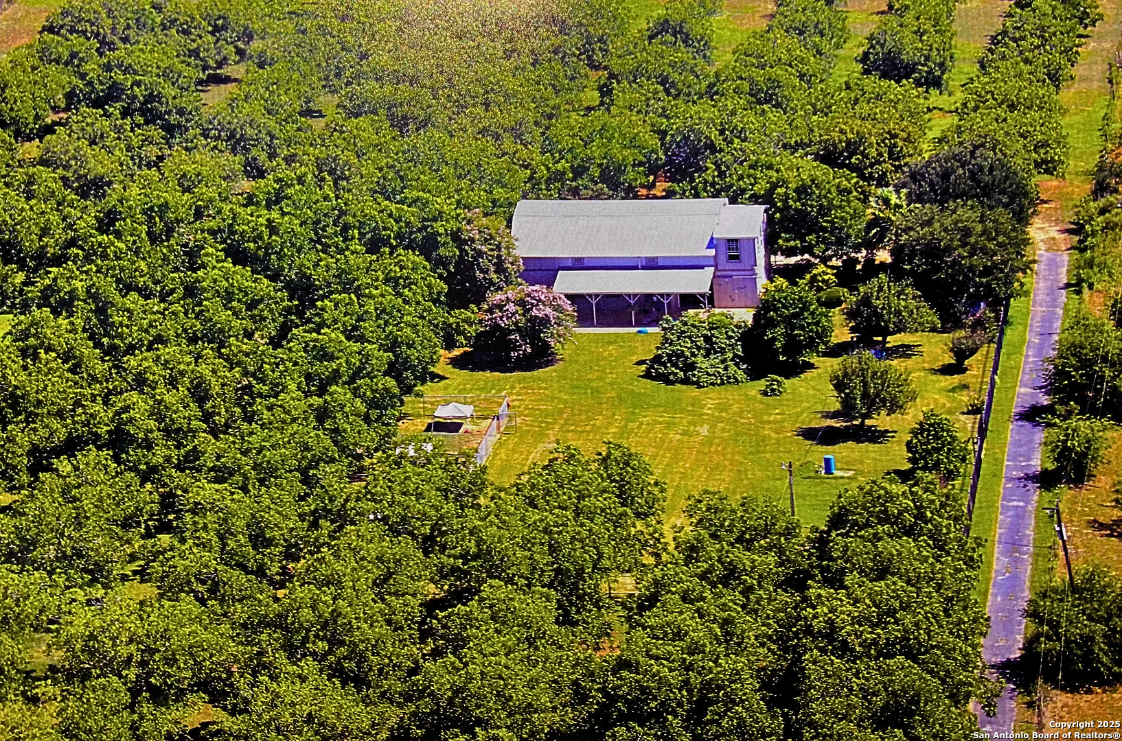 6 Collins Hill Road Lytle, TX 78052 - Photo 8 of 10 an aerial view of a house with a yard