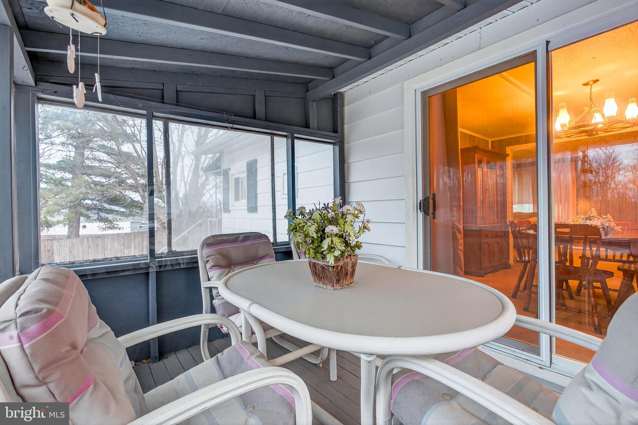 39 Commons Road Kutztown, PA 19530 - Photo 26 of 33 a view of a dining room with furniture window and wooden floor