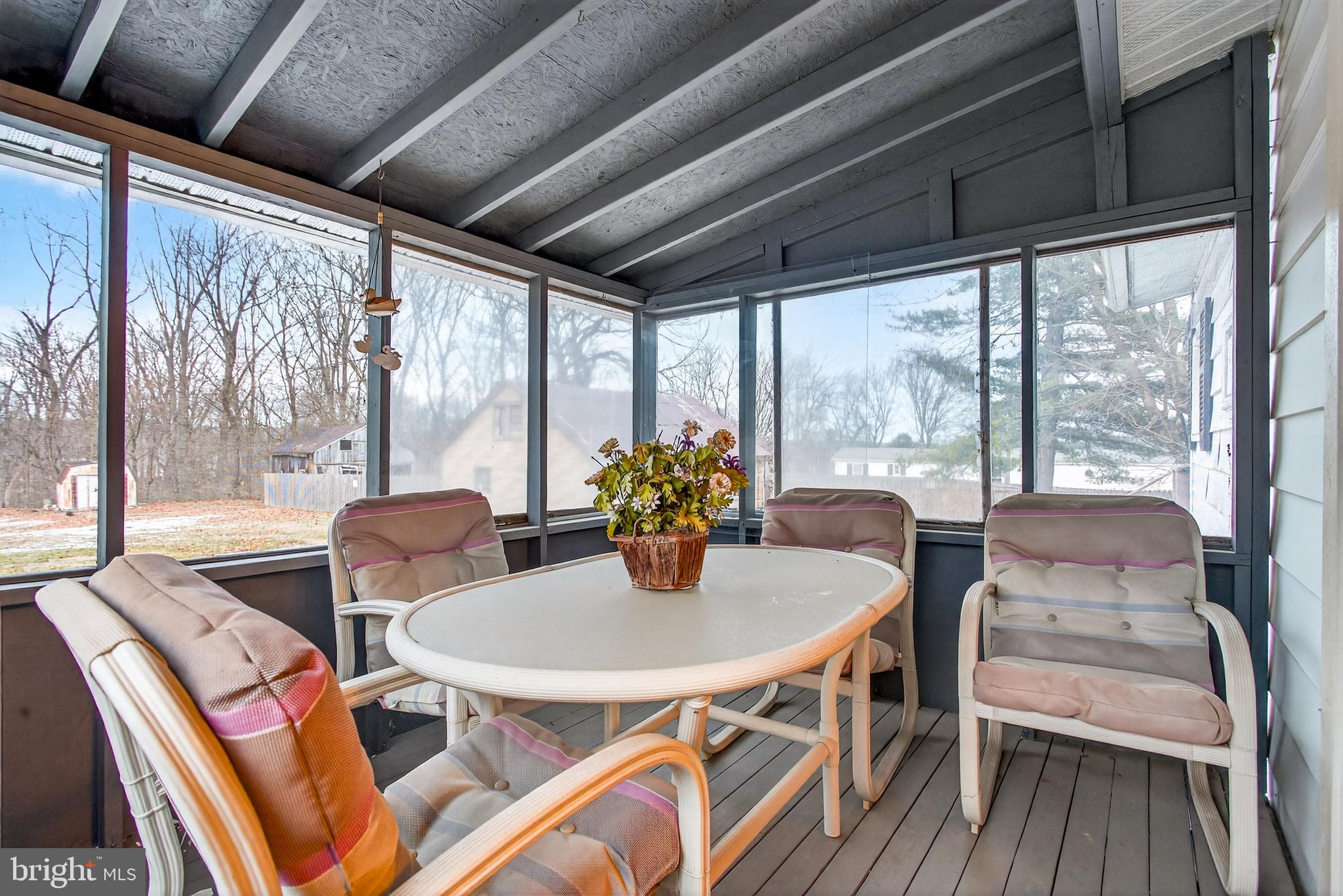 39 Commons Road Kutztown, PA 19530 - Photo 28 of 33 a view of a dining room with furniture window and outside view
