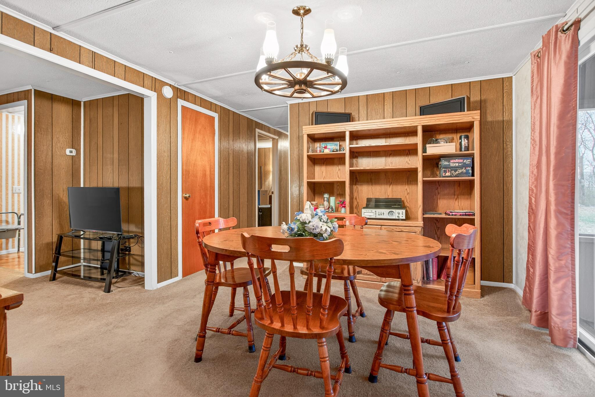 39 Commons Road Kutztown, PA 19530 - Photo 5 of 33 a view of a dining room with furniture window and outside view