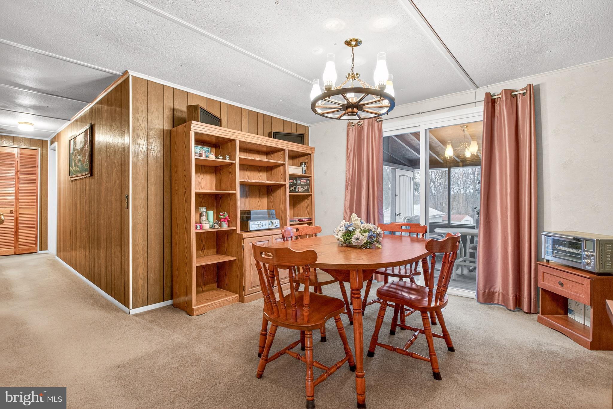 39 Commons Road Kutztown, PA 19530 - Photo 7 of 33 a view of a dining room with furniture window and outside view