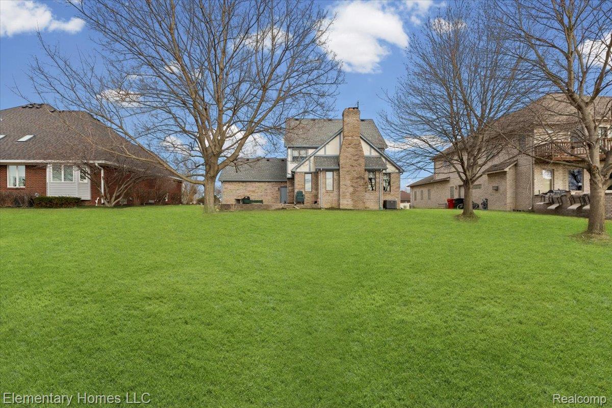 51637 Baker Road New Baltimore, MI 48047 - Photo 5 of 47 View of green lawn