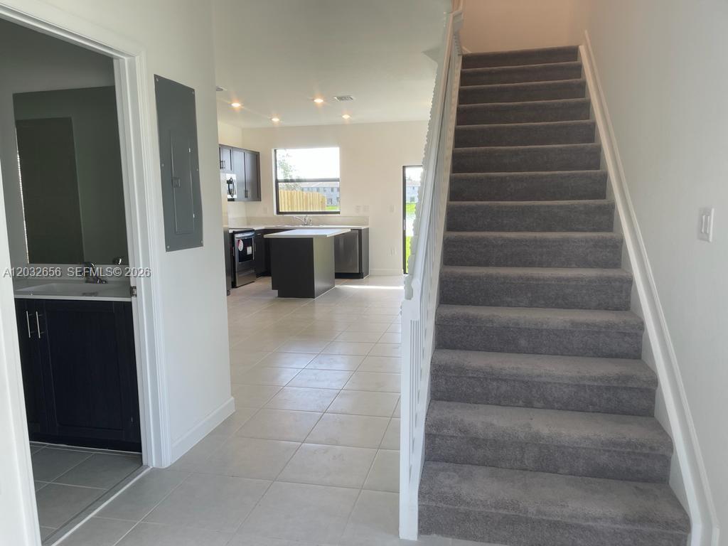 10144 Southwest 228th Terrace Miami, FL 33190 - Photo 6 of 23 a view of entryway and hall
