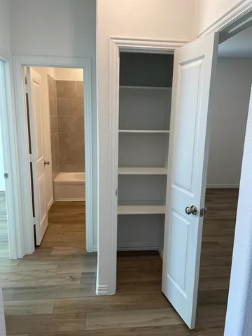 a view of a walk in closet