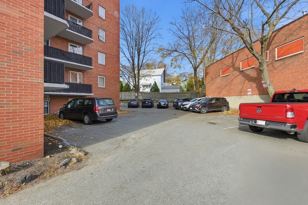 125 Trapelo Road, Unit U23 Belmont, MA 02478 - Photo 18 of 18 a cars parked on the side of a street