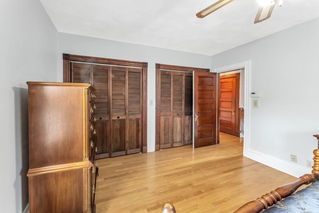 196 Maple Street Boston, MA 02132 - Photo 18 of 33 a view of empty room with wooden floor